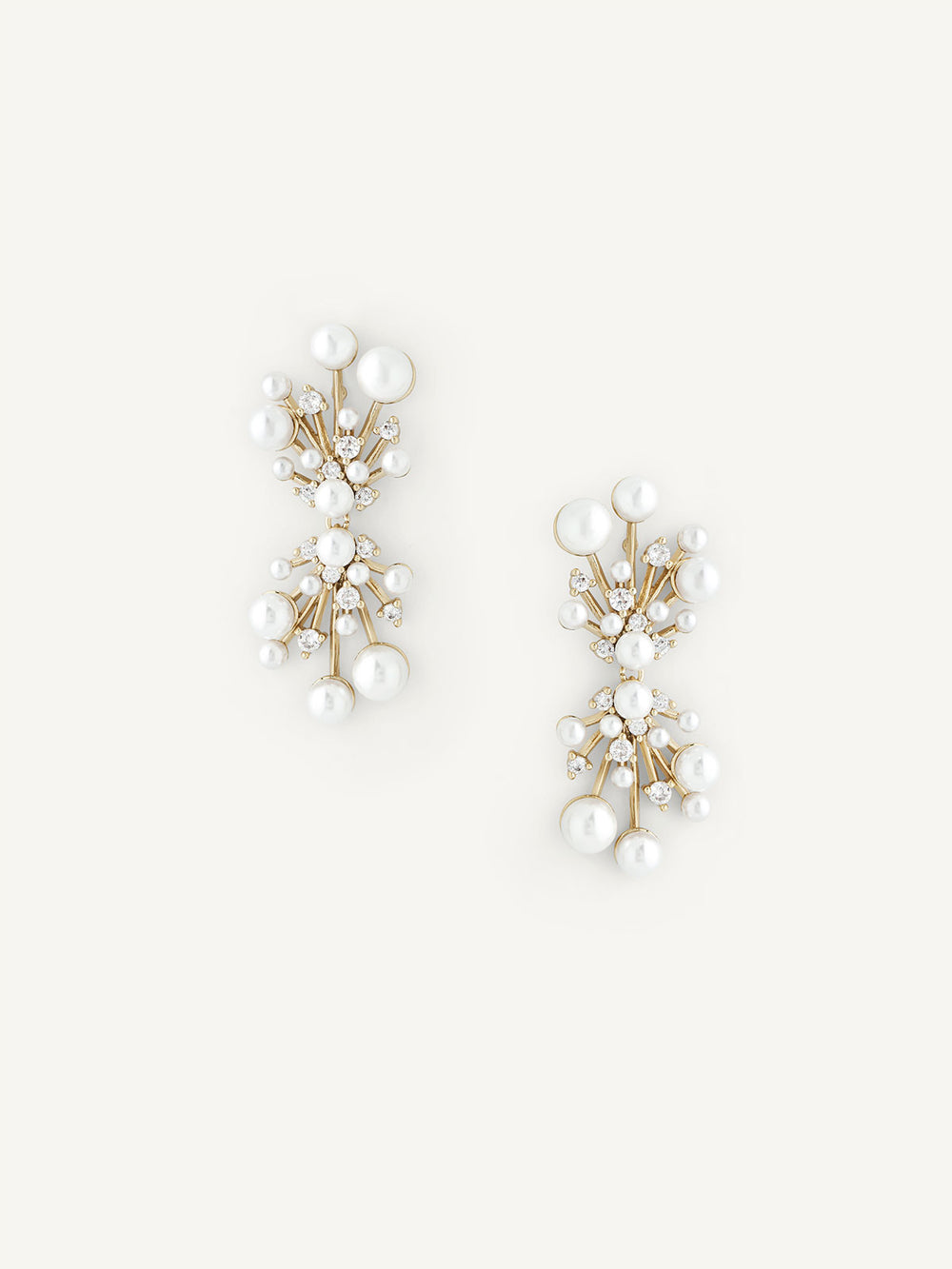 Pair of pearl earrings on a white background