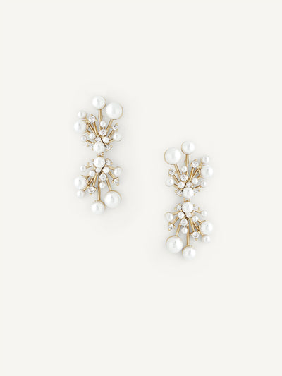 Pair of pearl earrings on a white background