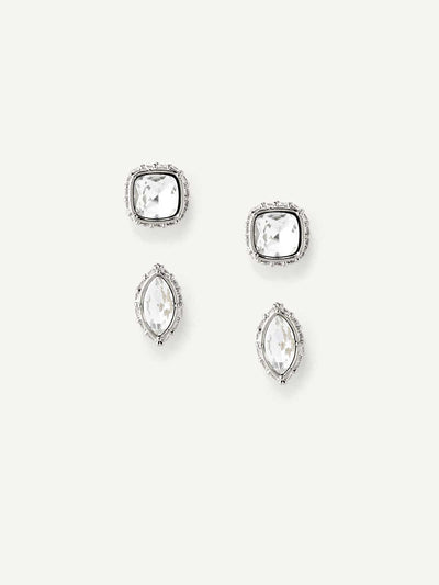 Set of silver crystal stud earrings on a white background