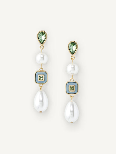 Pair of earrings with pearls and green gemstones on a white background