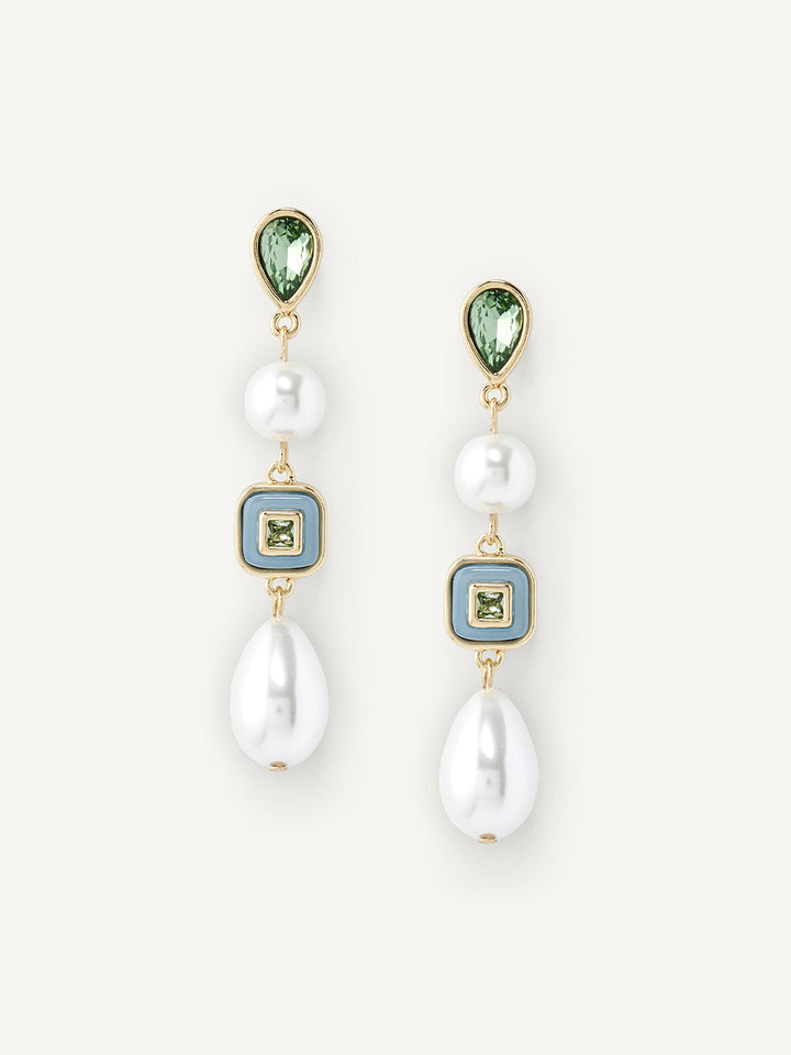 Pair of earrings with pearls and green gemstones on a white background