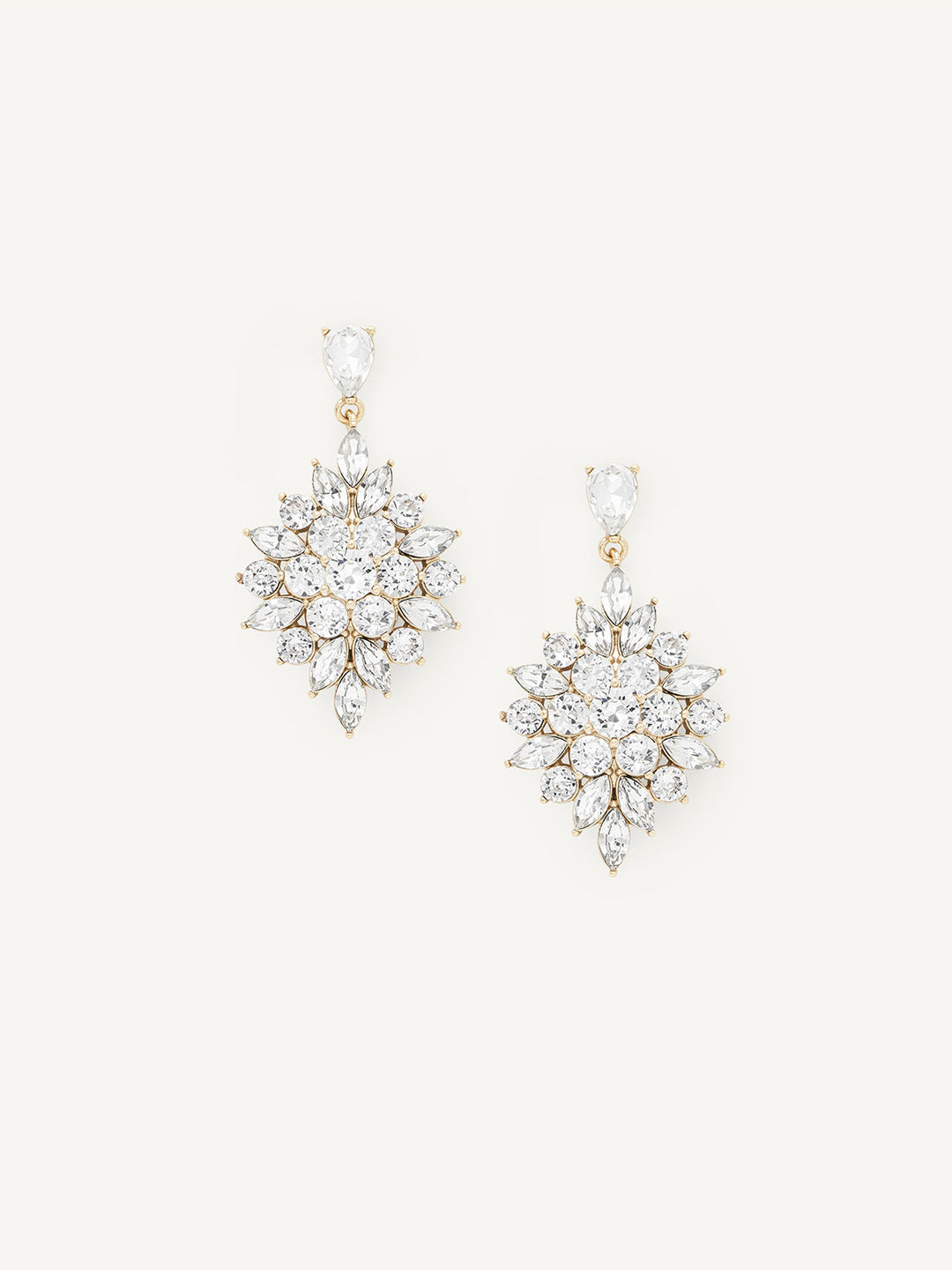 Pair of teardrop-shaped earrings with clear stones on a white background