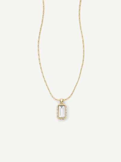 Gold necklace with a rectangular pendant on a white background