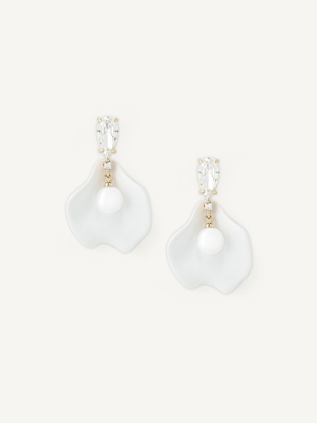 Pair of pearl earrings on a white background