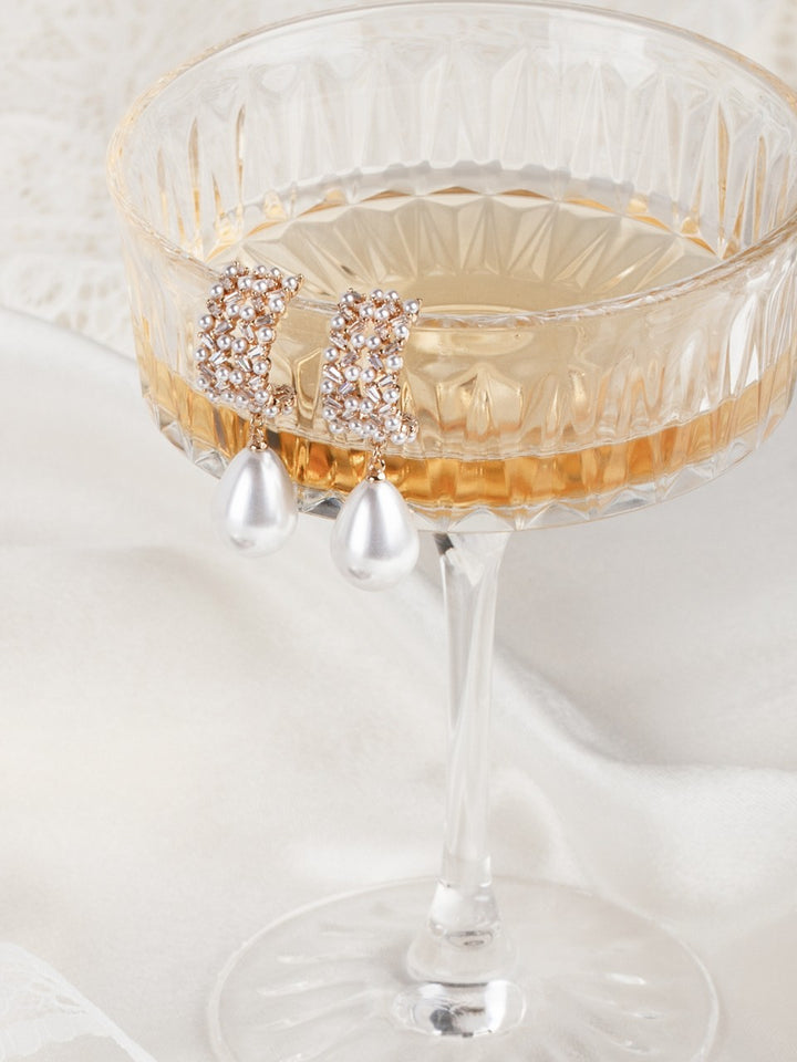 Decorative glass with a crystal decanter on a white background